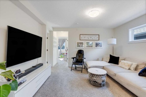 145 Lucas Crescent Nw, Calgary, AB - Indoor Photo Showing Living Room