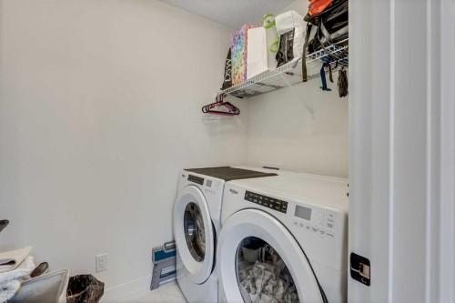 145 Lucas Crescent Nw, Calgary, AB - Indoor Photo Showing Laundry Room