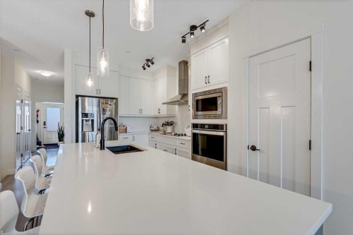 145 Lucas Crescent Nw, Calgary, AB - Indoor Photo Showing Kitchen With Upgraded Kitchen