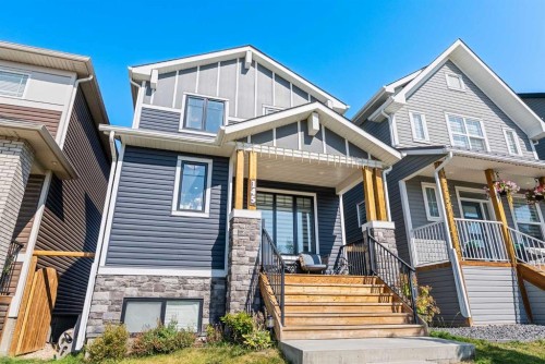 145 Lucas Crescent Nw, Calgary, AB - Outdoor With Facade