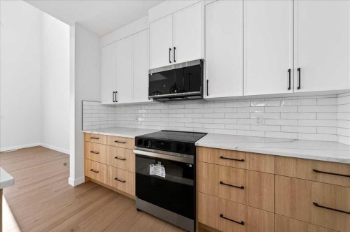 11 Lakewood Way, Strathmore, AB - Indoor Photo Showing Kitchen With Upgraded Kitchen