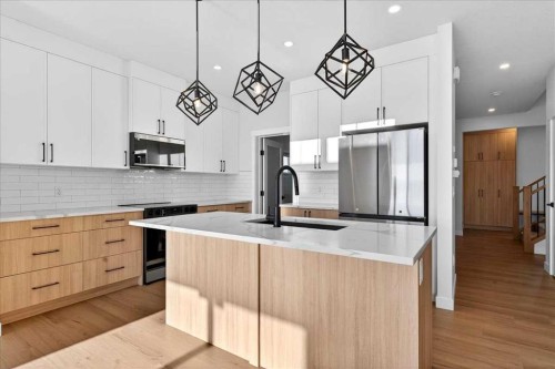 11 Lakewood Way, Strathmore, AB - Indoor Photo Showing Kitchen With Upgraded Kitchen
