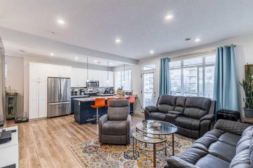 4307 Seton Drive Se, Calgary, AB - Indoor Photo Showing Living Room