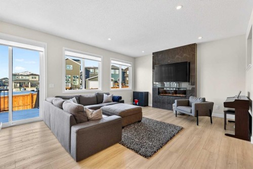 57 Legacy Reach View Se, Calgary, AB - Indoor Photo Showing Living Room