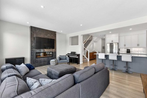 57 Legacy Reach View Se, Calgary, AB - Indoor Photo Showing Living Room