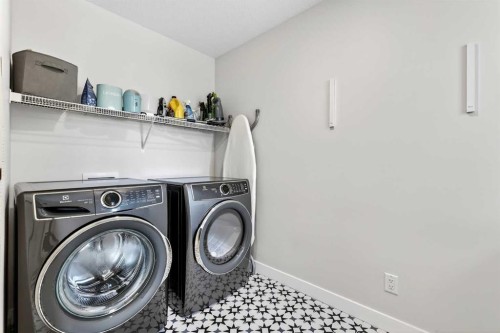 57 Legacy Reach View Se, Calgary, AB - Indoor Photo Showing Laundry Room