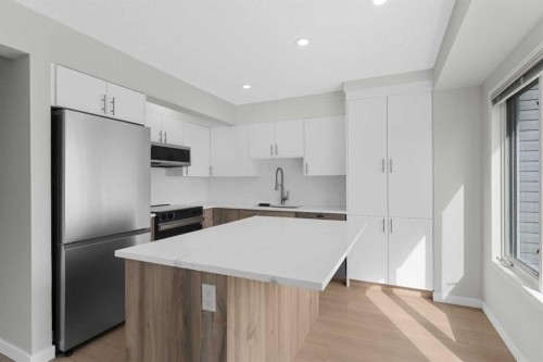 7 Prominence View Sw, Calgary, AB - Indoor Photo Showing Kitchen With Upgraded Kitchen