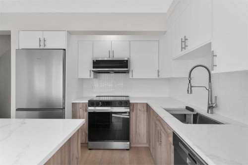 7 Prominence View Sw, Calgary, AB - Indoor Photo Showing Kitchen With Upgraded Kitchen