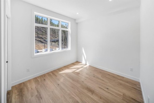 205-10 Cascade Ridge, Canmore, AB - Indoor Photo Showing Other Room