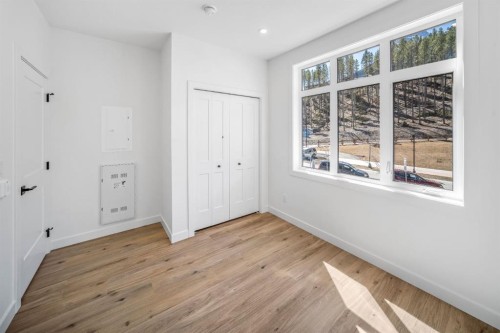 205-10 Cascade Ridge, Canmore, AB - Indoor Photo Showing Other Room