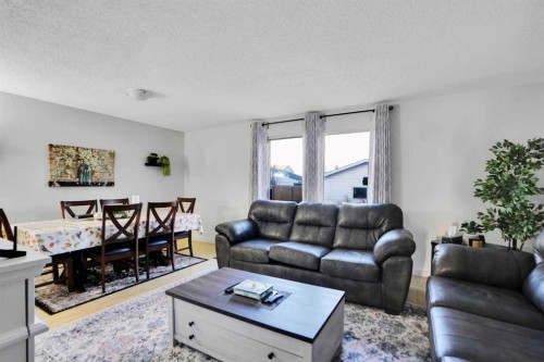 88 Abingdon Crescent Ne, Calgary, AB - Indoor Photo Showing Living Room