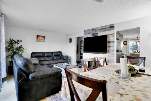 88 Abingdon Crescent Ne, Calgary, AB - Indoor Photo Showing Living Room