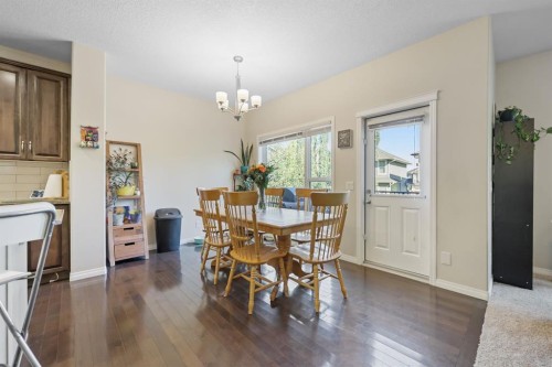 56 Jumping Pound Rise, Cochrane, AB - Indoor Photo Showing Dining Room