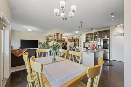 56 Jumping Pound Rise, Cochrane, AB - Indoor Photo Showing Dining Room