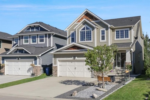 56 Jumping Pound Rise, Cochrane, AB - Outdoor With Facade