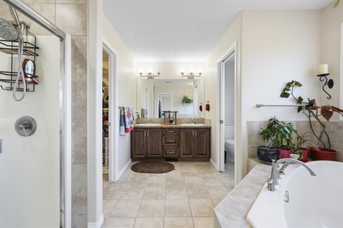 56 Jumping Pound Rise, Cochrane, AB - Indoor Photo Showing Bathroom