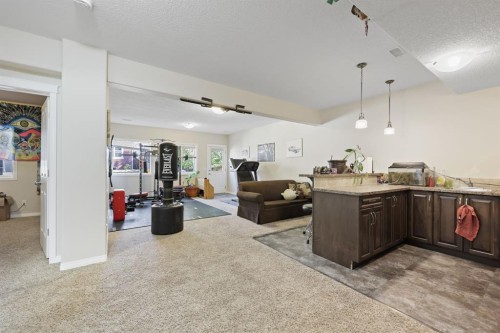 56 Jumping Pound Rise, Cochrane, AB - Indoor Photo Showing Other Room