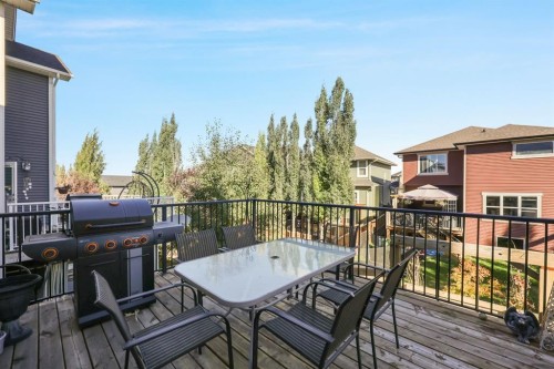 56 Jumping Pound Rise, Cochrane, AB - Outdoor With Deck Patio Veranda With Exterior
