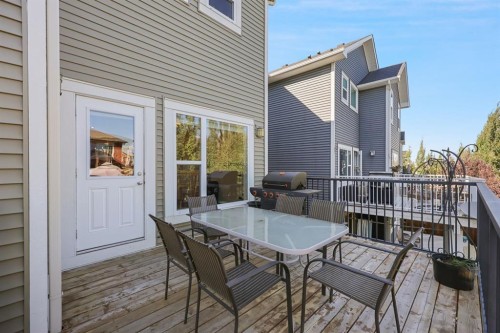 56 Jumping Pound Rise, Cochrane, AB - Outdoor With Deck Patio Veranda With Exterior