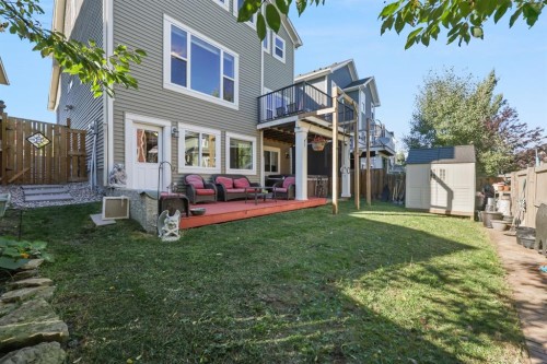 56 Jumping Pound Rise, Cochrane, AB - Outdoor With Deck Patio Veranda