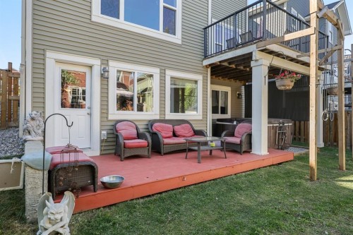 56 Jumping Pound Rise, Cochrane, AB - Outdoor With Deck Patio Veranda With Exterior