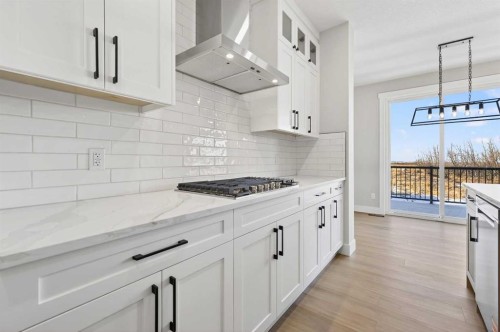 180 Wildrose Drive, Strathmore, AB - Indoor Photo Showing Kitchen With Upgraded Kitchen