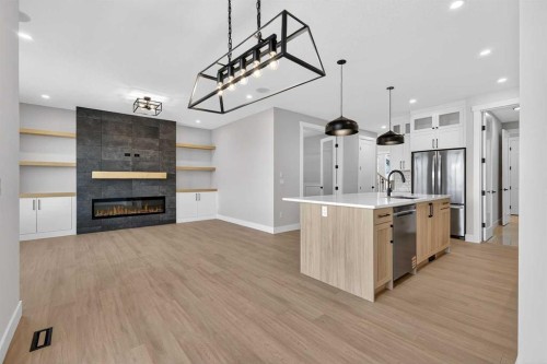 180 Wildrose Drive, Strathmore, AB - Indoor Photo Showing Other Room With Fireplace