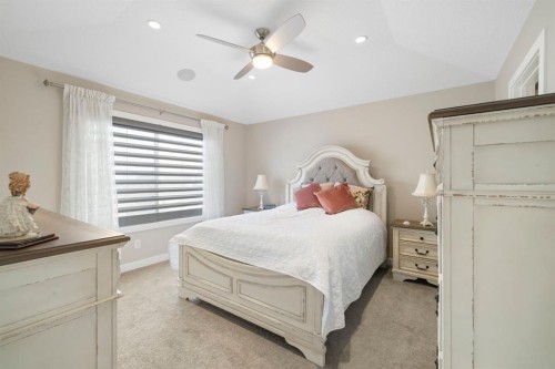 8 Emberside Glen, Cochrane, AB - Indoor Photo Showing Bedroom