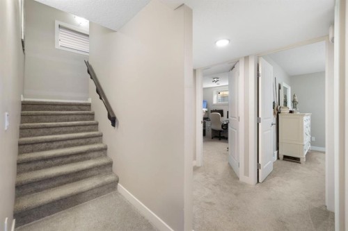 8 Emberside Glen, Cochrane, AB - Indoor Photo Showing Other Room