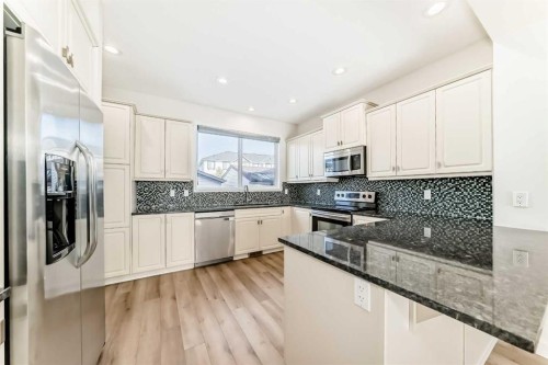 80 New Brighton Grove Se, Calgary, AB - Indoor Photo Showing Kitchen With Upgraded Kitchen