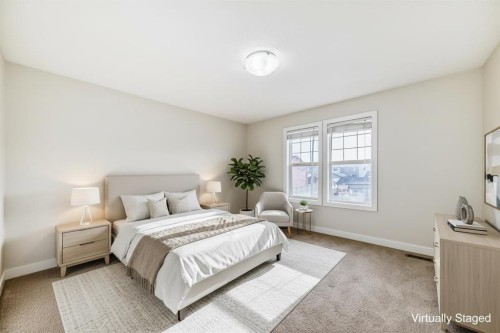 80 New Brighton Grove Se, Calgary, AB - Indoor Photo Showing Bedroom