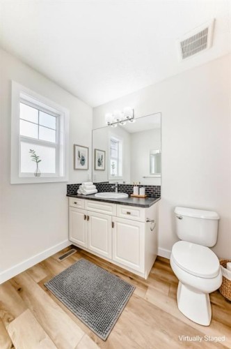 80 New Brighton Grove Se, Calgary, AB - Indoor Photo Showing Bathroom