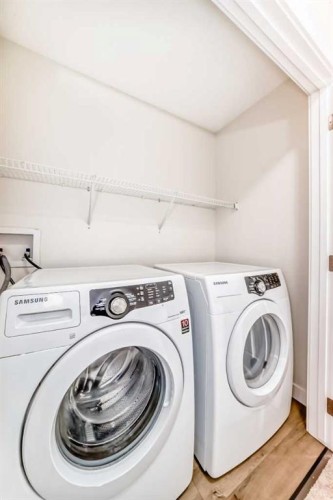 80 New Brighton Grove Se, Calgary, AB - Indoor Photo Showing Laundry Room