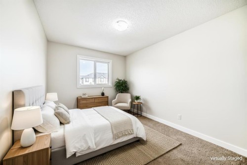 80 New Brighton Grove Se, Calgary, AB - Indoor Photo Showing Bedroom