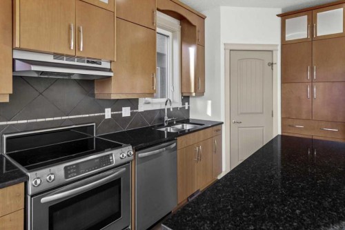 433 19 Avenue Ne, Calgary, AB - Indoor Photo Showing Kitchen With Double Sink