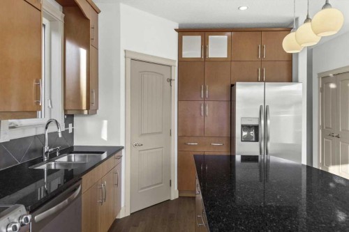 433 19 Avenue Ne, Calgary, AB - Indoor Photo Showing Kitchen With Stainless Steel Kitchen With Double Sink With Upgraded Kitchen