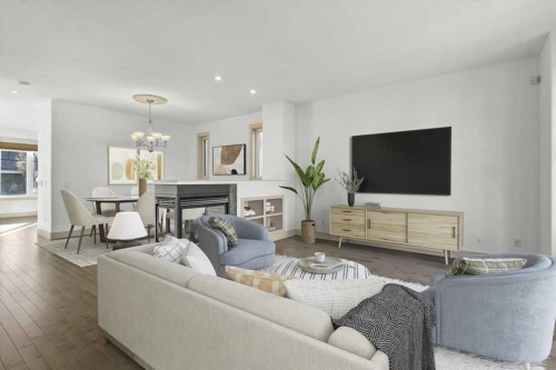 433 19 Avenue Ne, Calgary, AB - Indoor Photo Showing Living Room With Fireplace