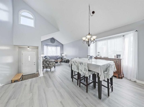 9 Hunters Mews, Okotoks, AB - Indoor Photo Showing Dining Room
