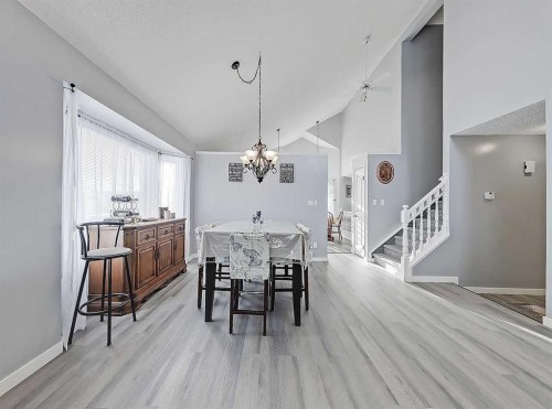 9 Hunters Mews, Okotoks, AB - Indoor Photo Showing Dining Room