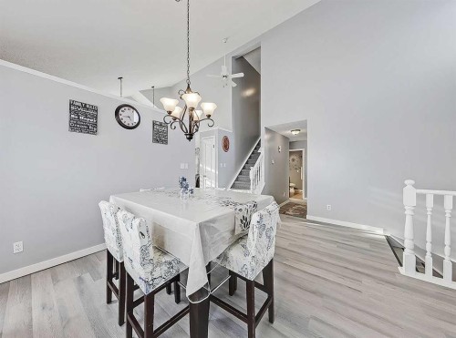 9 Hunters Mews, Okotoks, AB - Indoor Photo Showing Dining Room