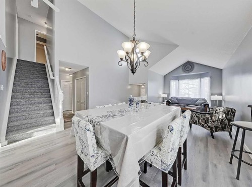 9 Hunters Mews, Okotoks, AB - Indoor Photo Showing Dining Room