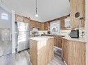 9 Hunters Mews, Okotoks, AB  - Indoor Photo Showing Kitchen 