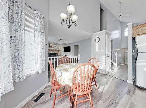 9 Hunters Mews, Okotoks, AB - Indoor Photo Showing Dining Room