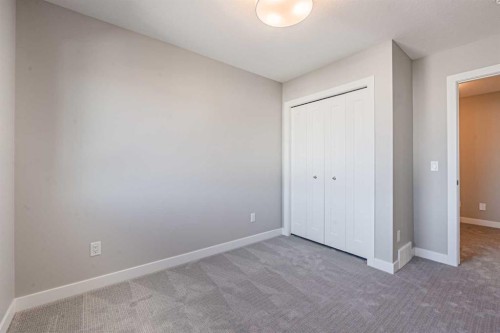 129 Dawson Wharf View, Chestermere, AB - Indoor Photo Showing Other Room