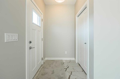 129 Dawson Wharf View, Chestermere, AB - Indoor Photo Showing Other Room