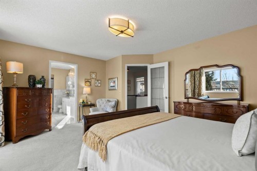 63 Springbank Crescent Sw, Calgary, AB - Indoor Photo Showing Bedroom