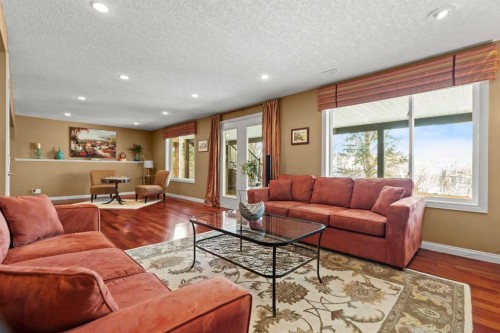 63 Springbank Crescent Sw, Calgary, AB - Indoor Photo Showing Living Room