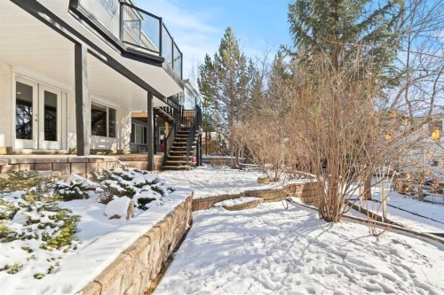 63 Springbank Crescent Sw, Calgary, AB - Outdoor With Deck Patio Veranda