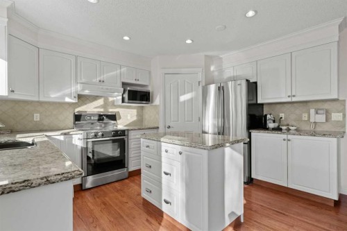 63 Springbank Crescent Sw, Calgary, AB - Indoor Photo Showing Kitchen With Upgraded Kitchen