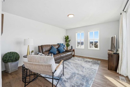 102 Setonstone Manor Se, Calgary, AB - Indoor Photo Showing Living Room